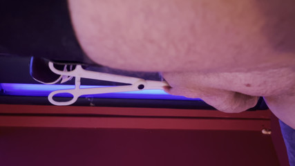 Kinky CBT Preparing for Self Scrotum Piercing.