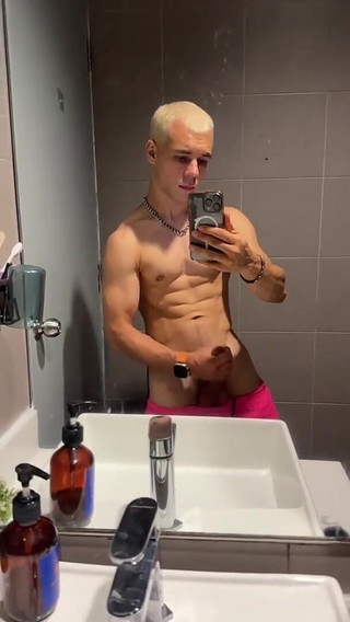 Handsome Blonde Fingering His Dick in the Train Toilet