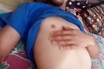 Young Boy Rubbing Nipples and Chest