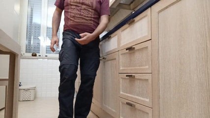 Desperate Pissing in the Kitchen