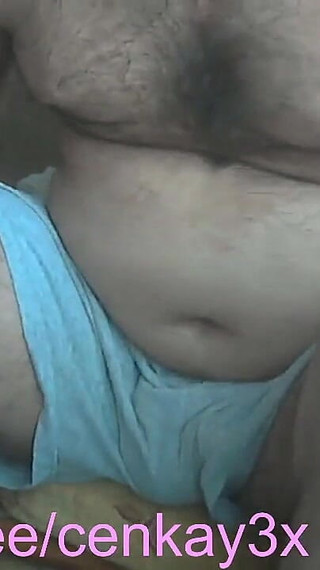 Stepdaddy Is Playing with His Dick on Air with a Cigarette in His Mouth and Slowly Undressing