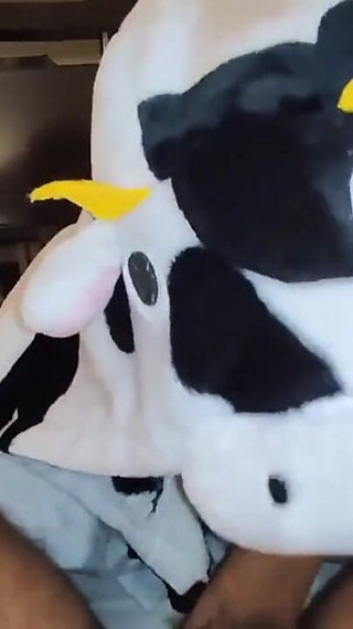 In a cow pijama sucking and riding my big uncut cock until he earns my hot milk
