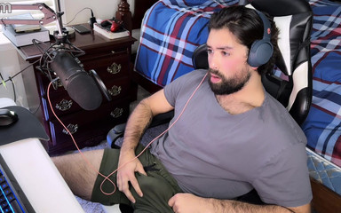 Hot guy teases himself while watching porn