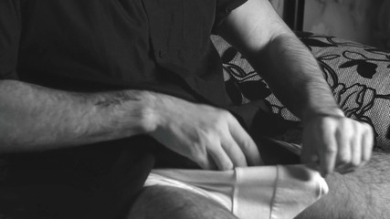 The Boy Jerks off Close-up with a Condom and Cums Loudly Into It.