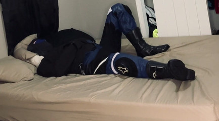 Biker in a Straitjacket and Tied