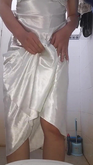 Asian Crossdresser wearing long silky nightie gown