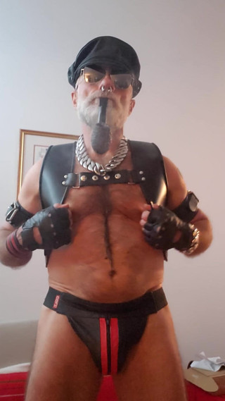 Cigar Stepdad Enjoyin Pipe with a New Pair of Nipple Clamps From Meo.de, Waiting for a Boy to Come and Play with Them