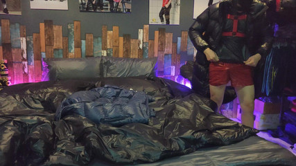 Cock Rubbing Down Jacket on Shiny Nylon Bed