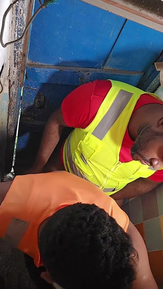 Construction Site Bathroom and Workers