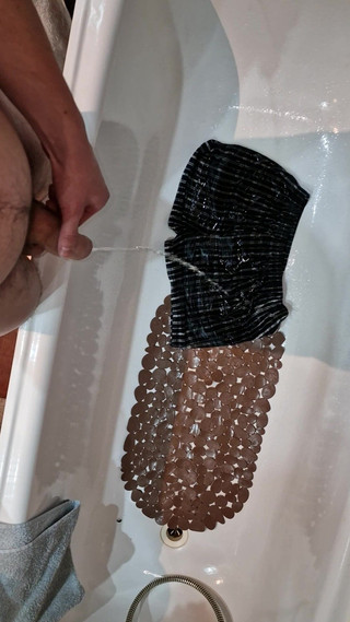I took off my boxers, threw them into the bathtub and I peed on them