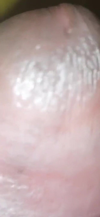 A Man Is Satisfying His Desires Through Self-stimulation in His Own Bedroom.