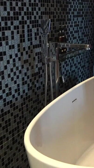 Chubby Stepdaddy Pissing in Bathtub