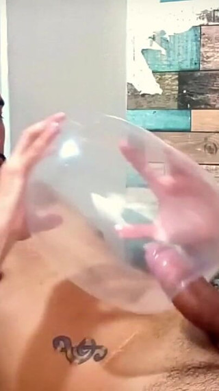 Fucking an inflated condom until I cum inside of it