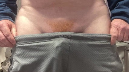 Ginger Cock Pops Out of Shorts